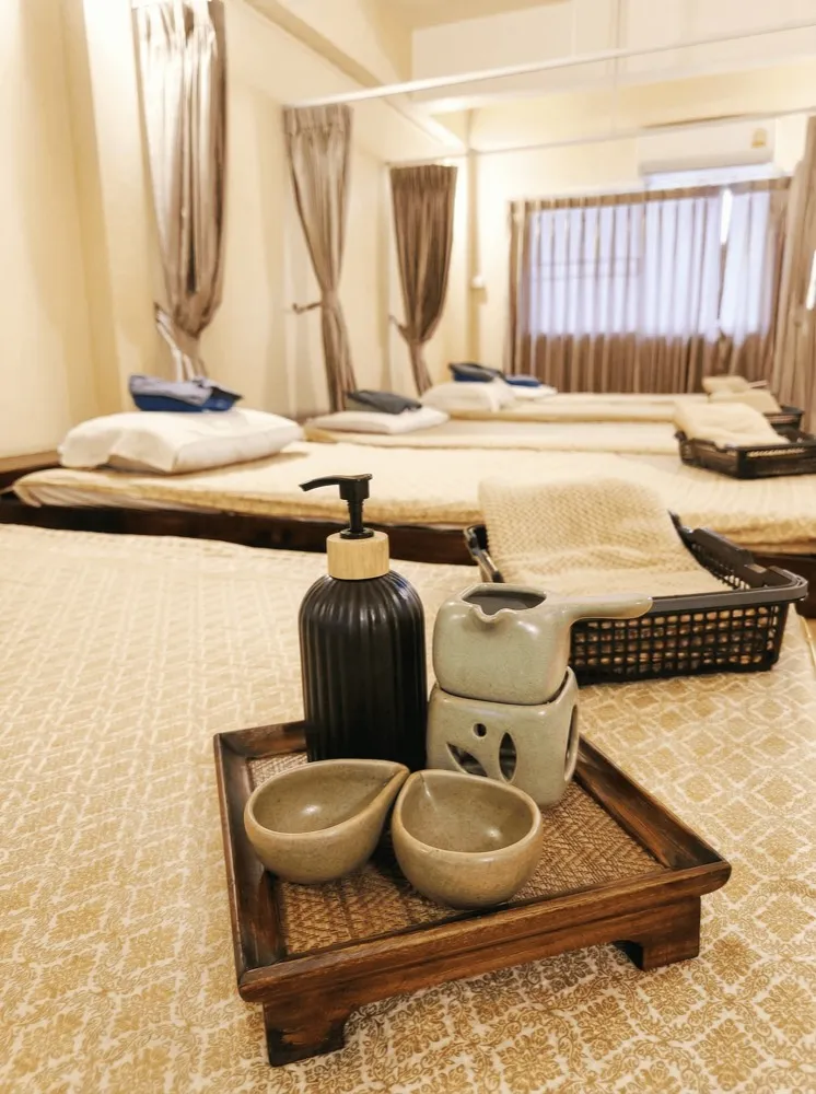 Tray of massage oil and ceramic bowls